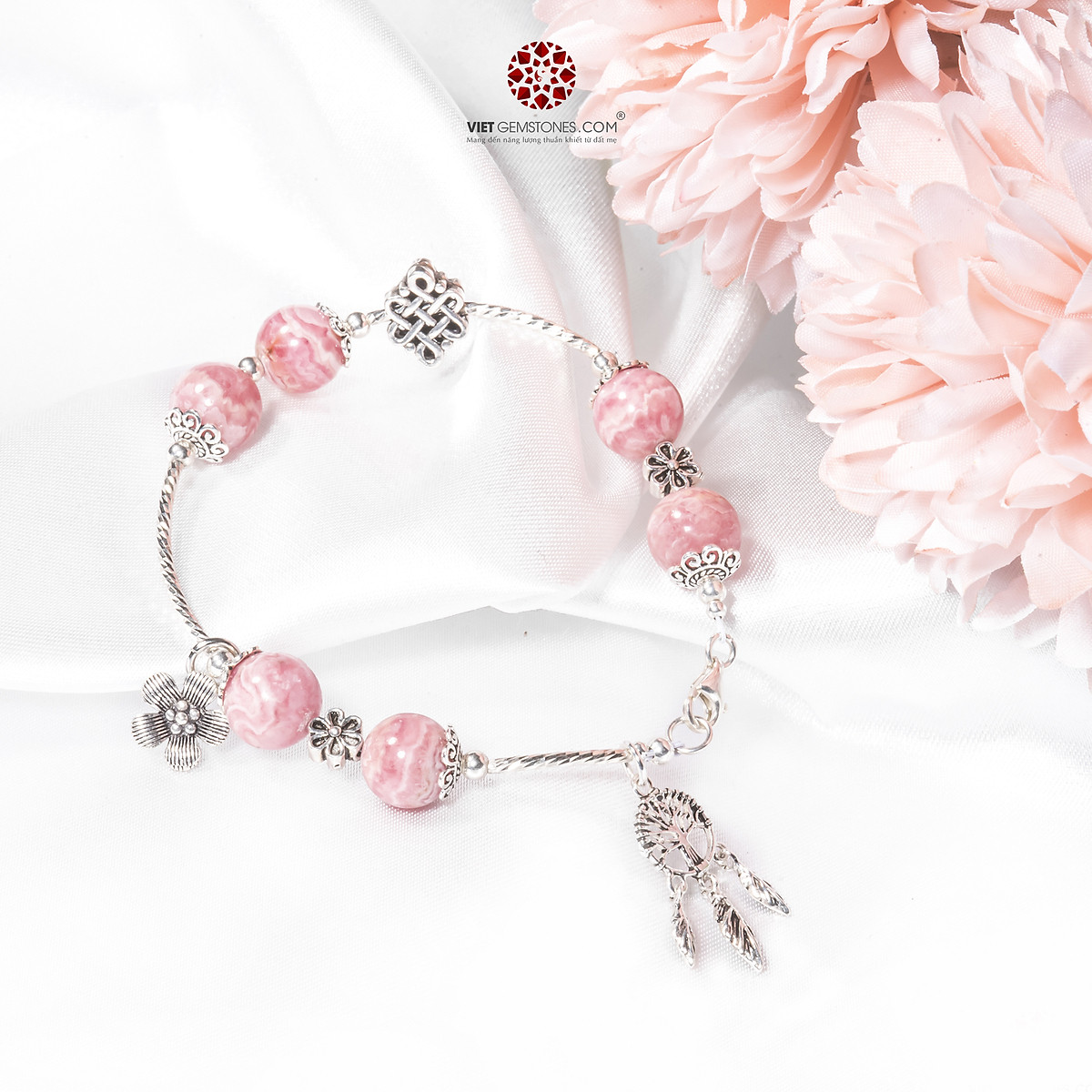 Lắc Tay Đá Đào Hoa phối charm...
