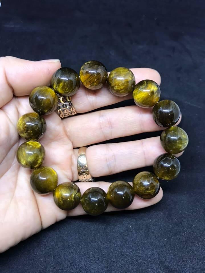 Vòng tay dương biển đen ánh vàng 14ly